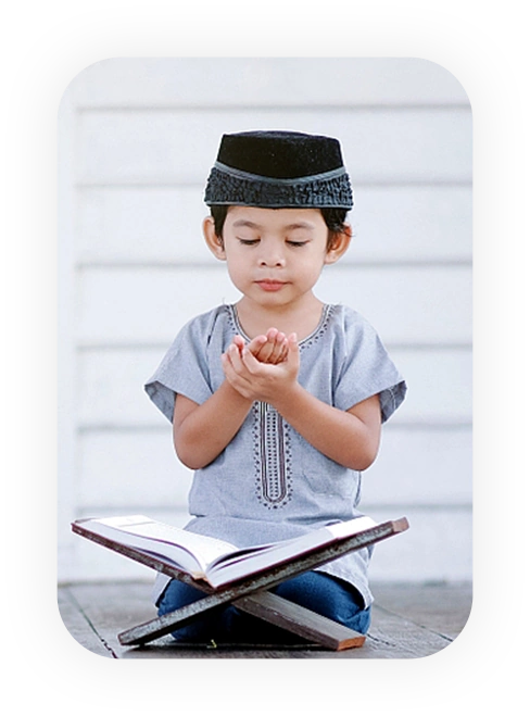 Child reading the Quran